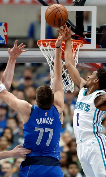 Mavericks top Hornets 99-93 as Dallas deals Barnes to Kings